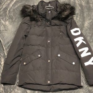 DKNY black puffer jacket with faux fur hood.